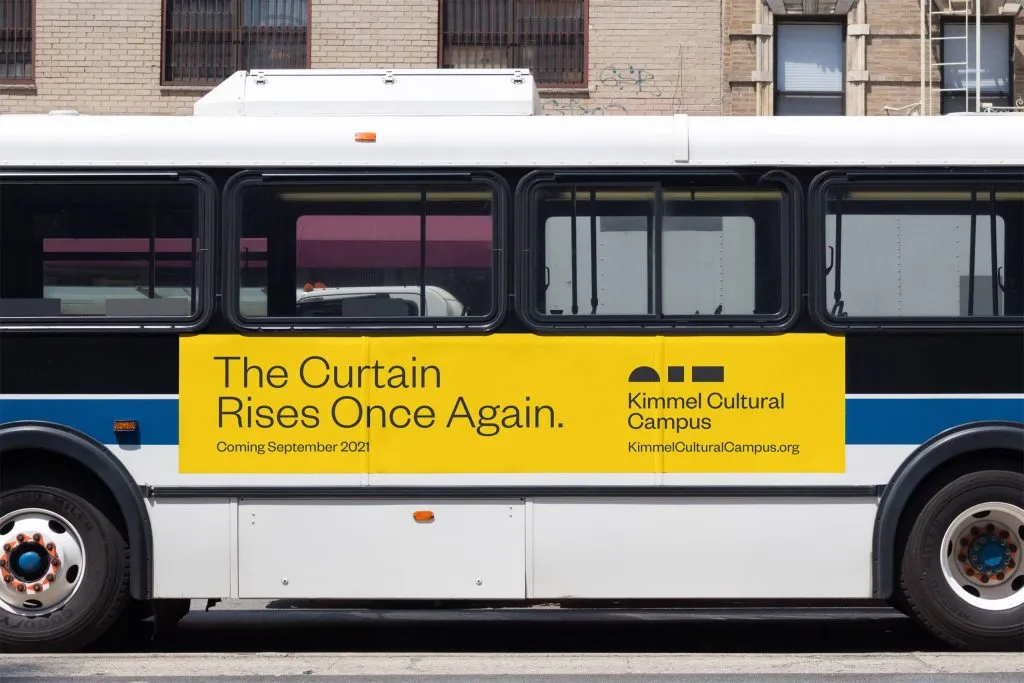 Bus advertisement featuring sans serif typography on solid color background, design by J2 for Kimmel Cultural Campus