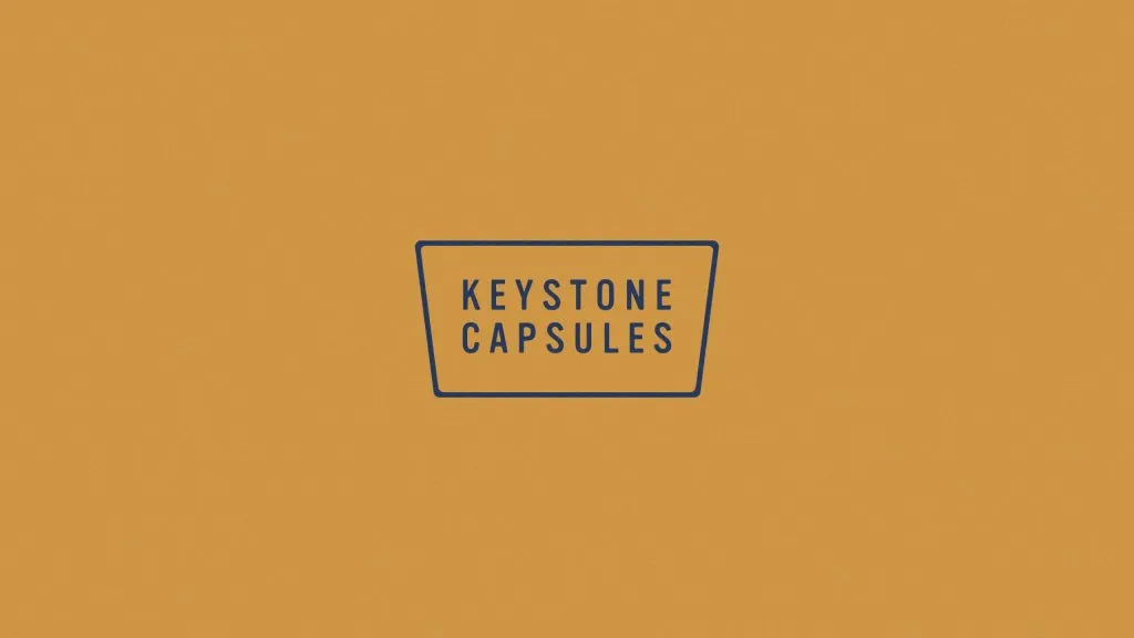 Modern keystone shaped wine company logo