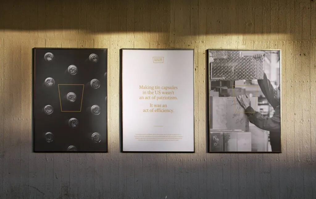 three brand posters for wine company on modern wood wall