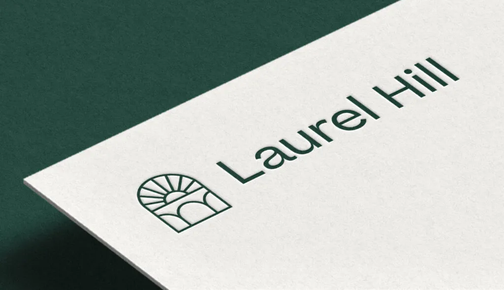 Mono-weight logo on stationery for Laurel Hill Cemetery and Arboretum logo by J2