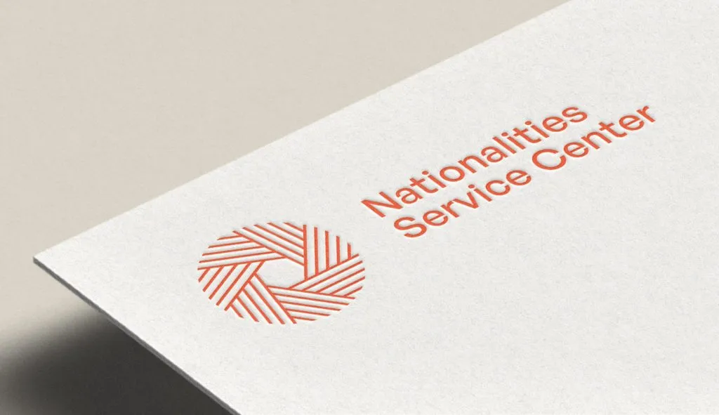 Embossed orange radial logo and wordmark