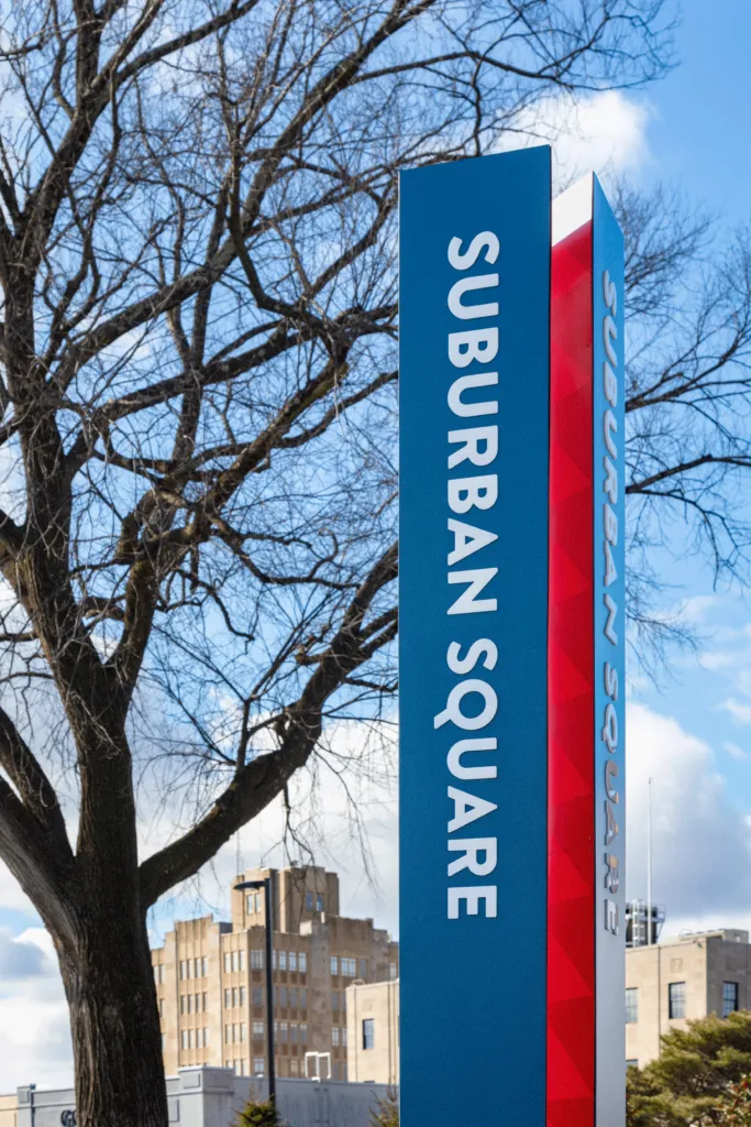 modern pillar identification signage for outdoor retail destination