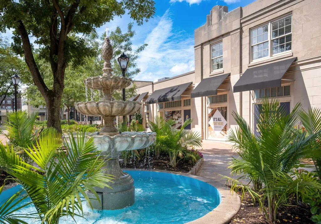 retail destination with fountain and branding in the background