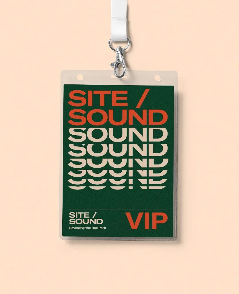 typographic VIP lanyard with bold kinetic logo for arts festival