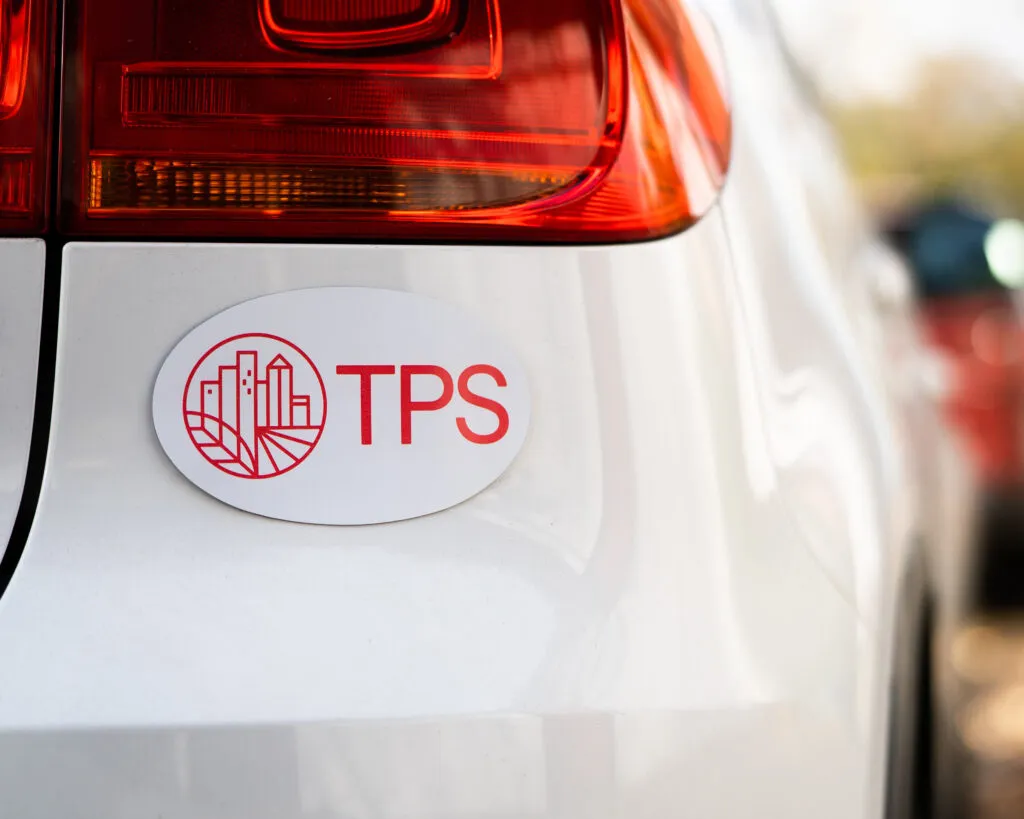 car magnet with TPS text and logo, graphic design and branding by J2