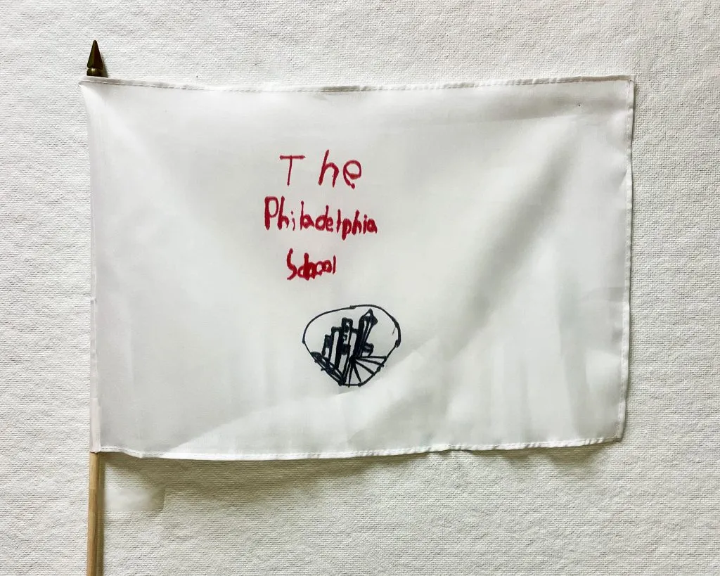 Kid's artwork on a homemade flag