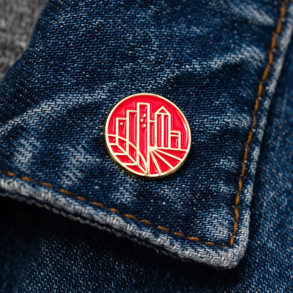 Enamel pin featuring The Philadelphia School logo, graphic design by J2