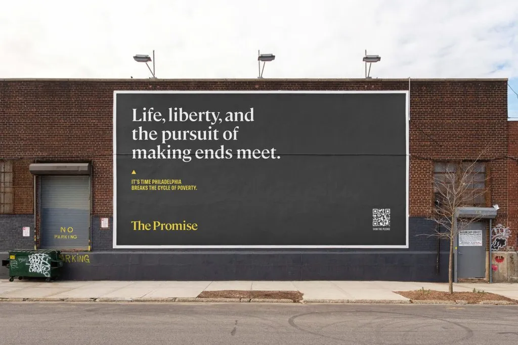 billboard with white and yellow typography on a black background, branding and graphic design by J2 for The Promise