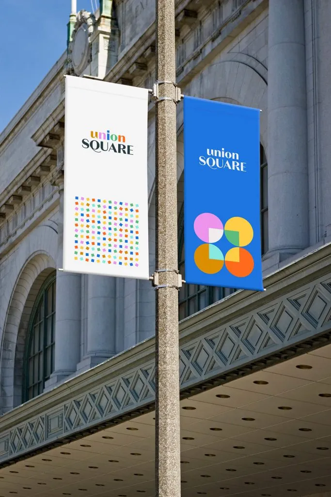 Lamp post banner with Union Square typography and logo designed by J2