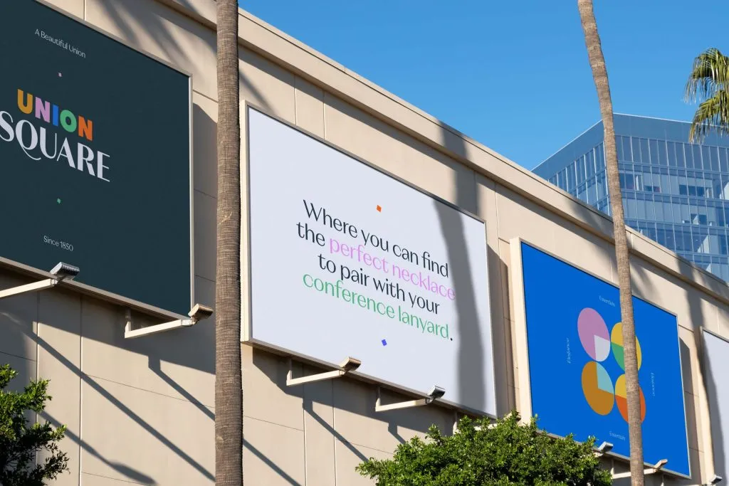 billboards with bright colored type and logos, Union Square branding by J2