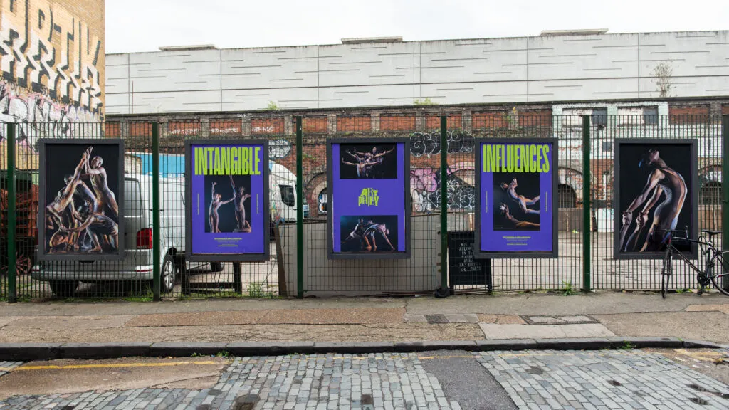 ArtPhilly branded posters by J2. Photos of dancers and festival logo on a purple background.