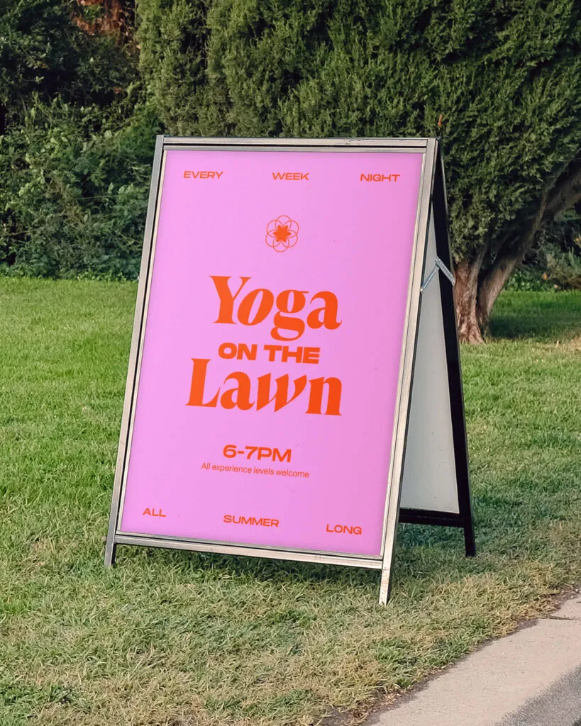 A-frame sign advertising outdoor yoga event. Design for Penn's Landing Park by J2.