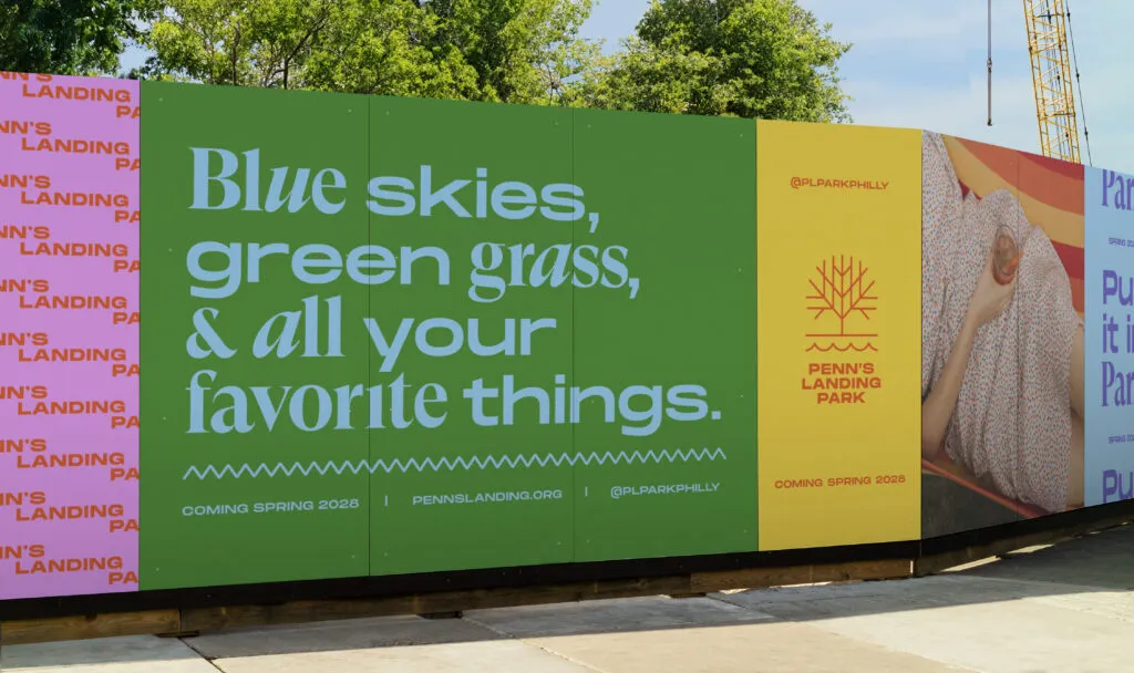 Mockup of street billboard featuring bright colors and modern type. Designed for Penn's Landing Park by J2.