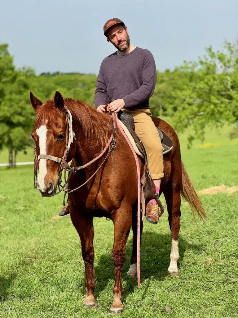 Jason Rothman, Partner and Creative Director at J2 on a horse