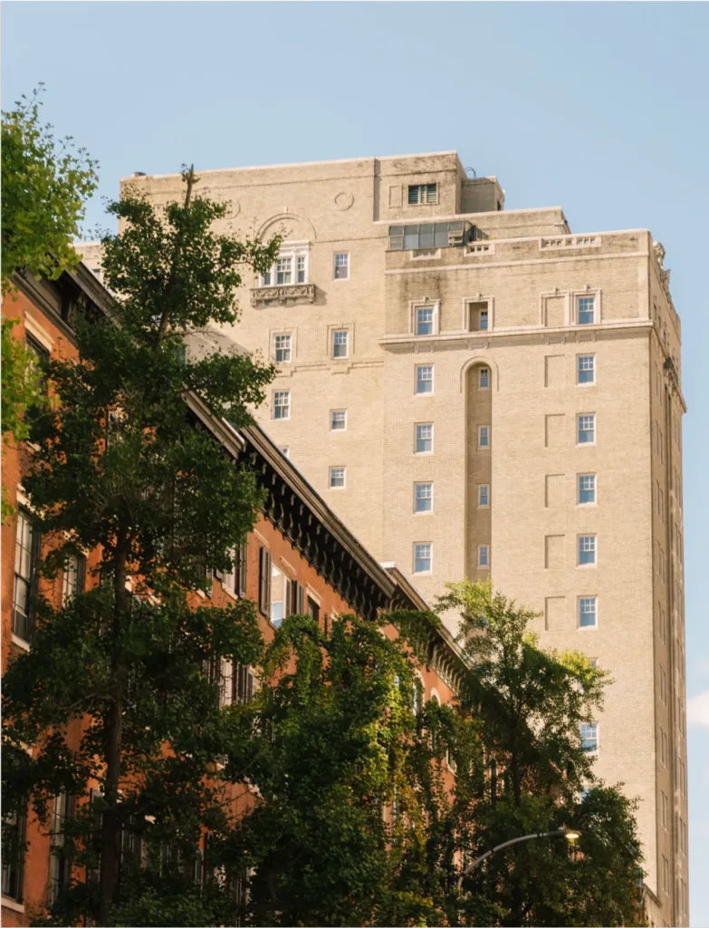 side view of The Muse Philadelphia, a historic building in a city setting